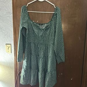 A brand new green floral dress and it’s a size medium